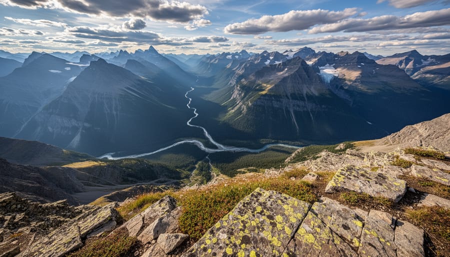 Hiker on a ridge in Jasper National Park with expansive mountain valley views